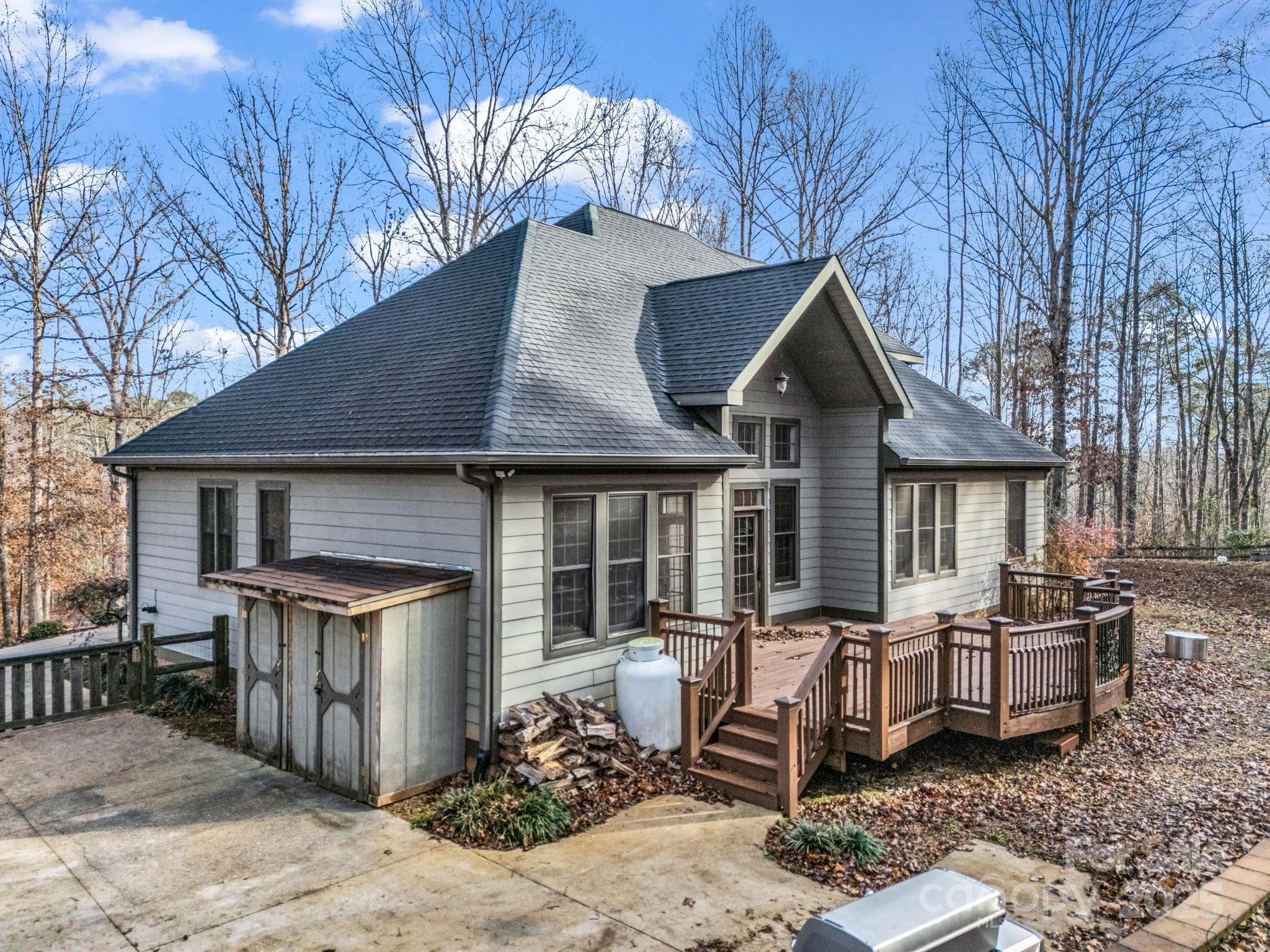 351 East Rambling Creek Drive Tryon, NC 28782 - Photo 42 of 48 a front view of a house with garden