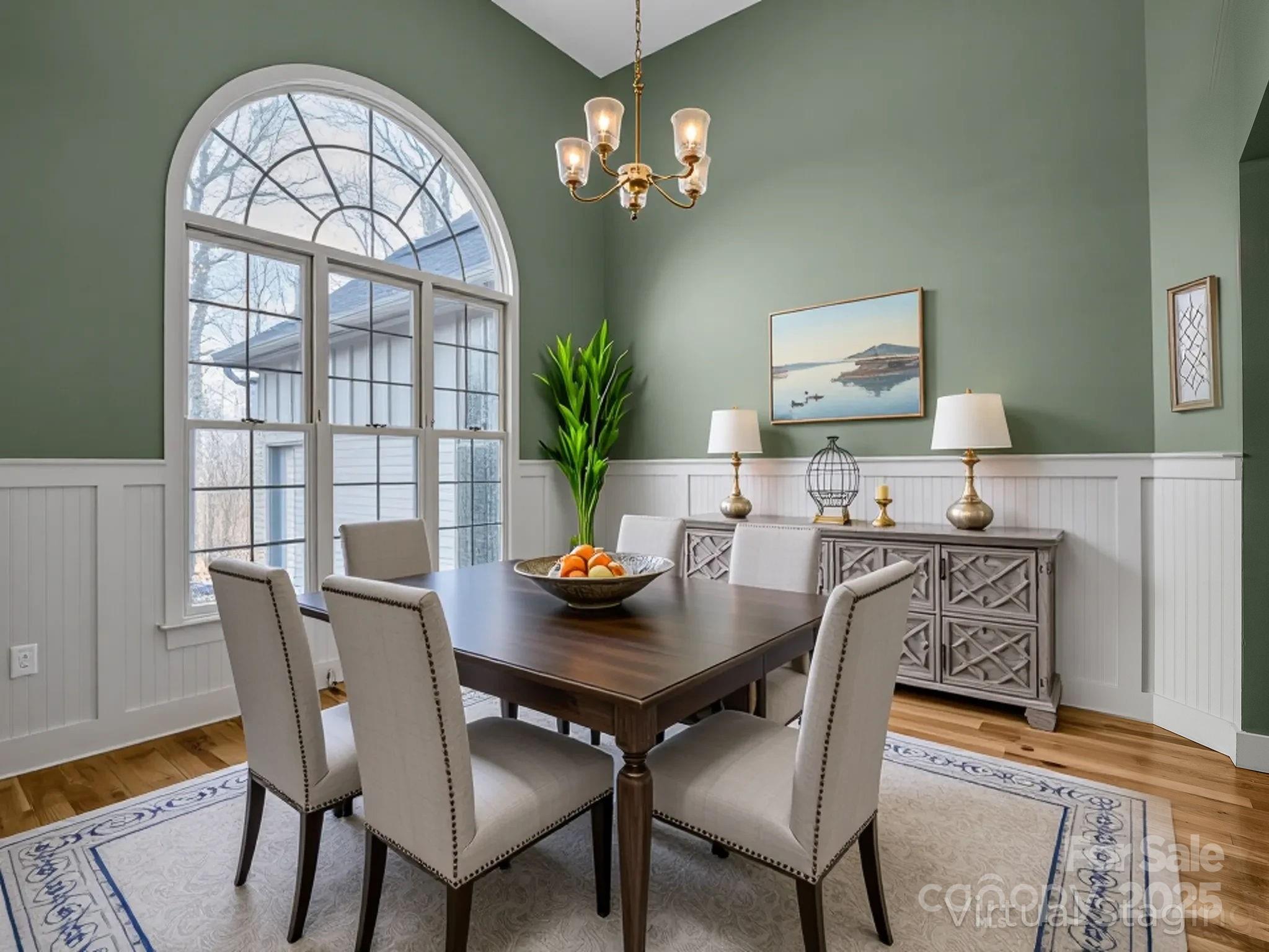 351 East Rambling Creek Drive Tryon, NC 28782 - Photo 7 of 48 a view of a dining room with furniture and chandelier