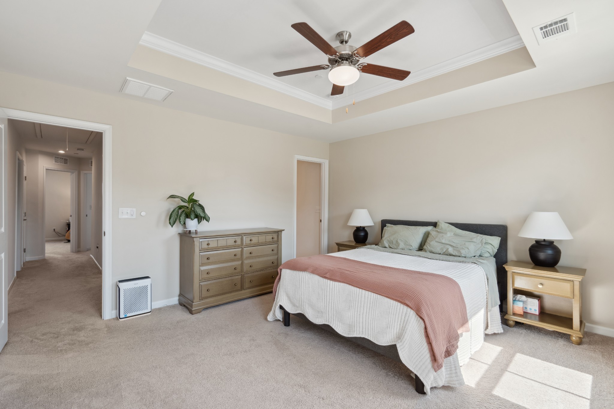 159 Keelon Gap Road Spring Hill, TN 37174 - Photo 15 of 23 a bedroom with a bed and a chandelier