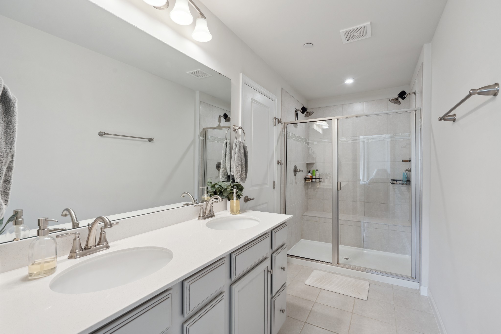 159 Keelon Gap Road Spring Hill, TN 37174 - Photo 16 of 23 a bathroom with a shower sink vanity mirror and toilet