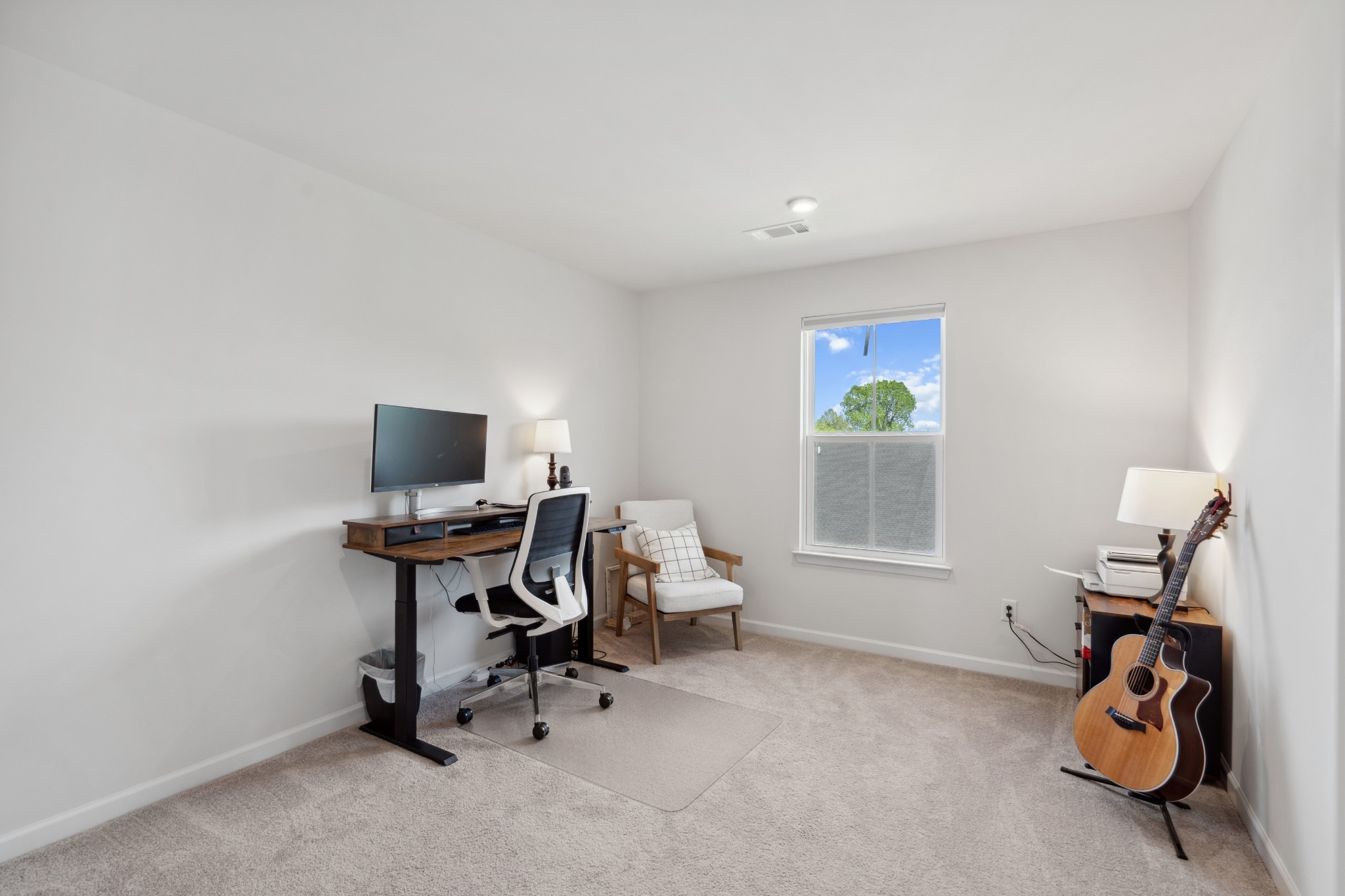 159 Keelon Gap Road Spring Hill, TN 37174 - Photo 18 of 23 a view of a workspace with furniture and a window