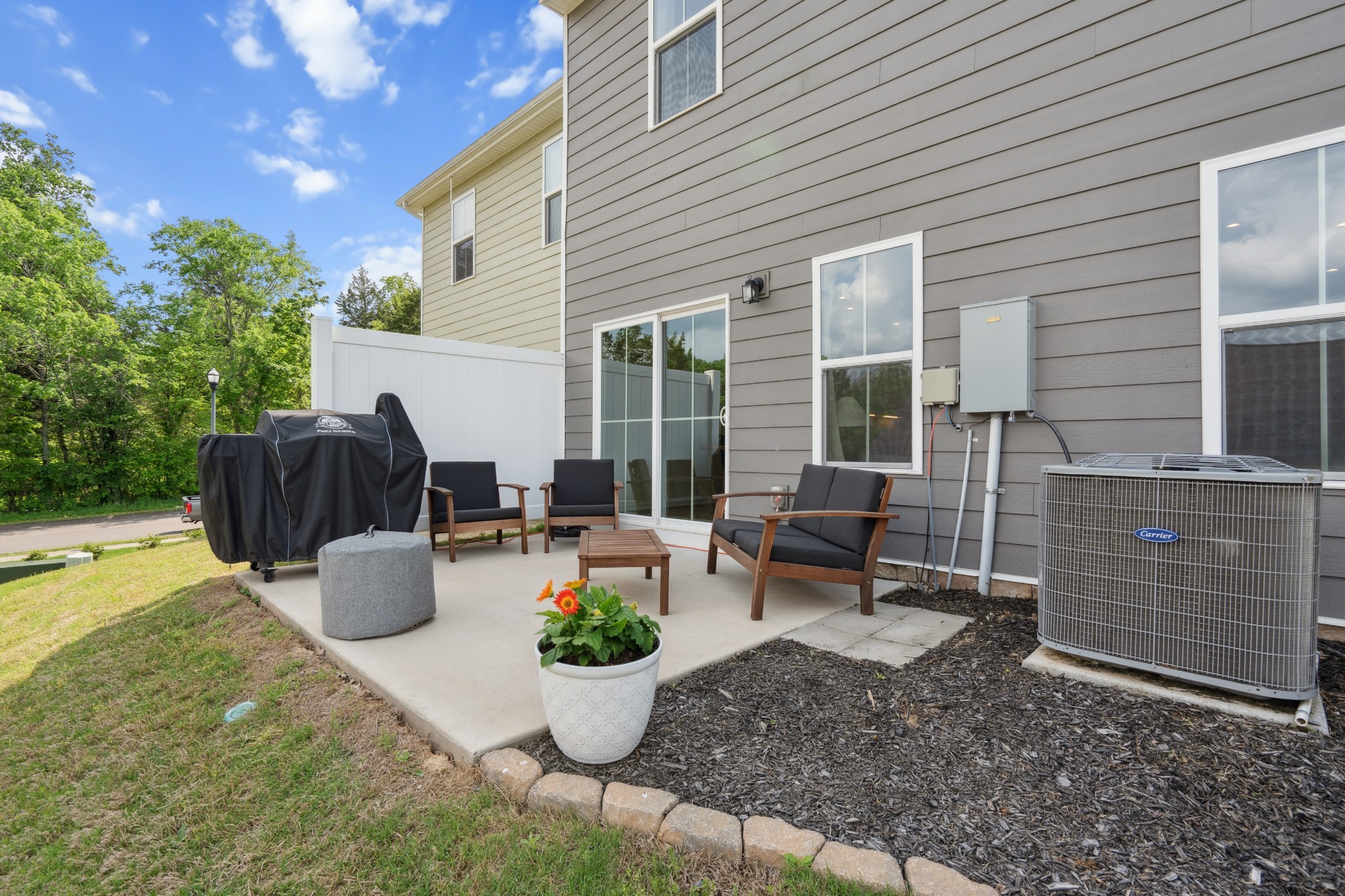 159 Keelon Gap Road Spring Hill, TN 37174 - Photo 23 of 23 a view of a backyard with garden and patio