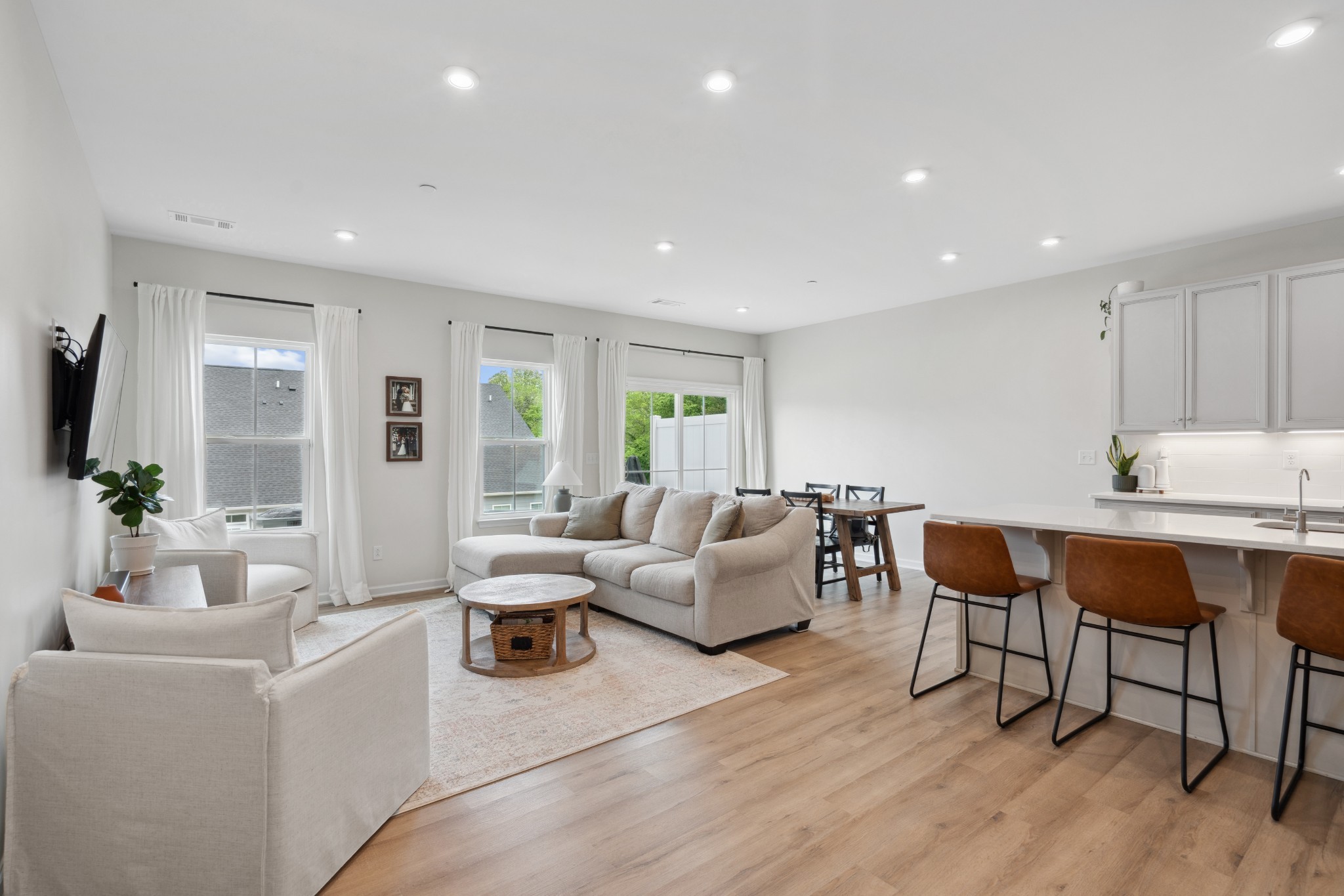 159 Keelon Gap Road Spring Hill, TN 37174 - Photo 5 of 23 a living room with furniture a wooden floor and a large window