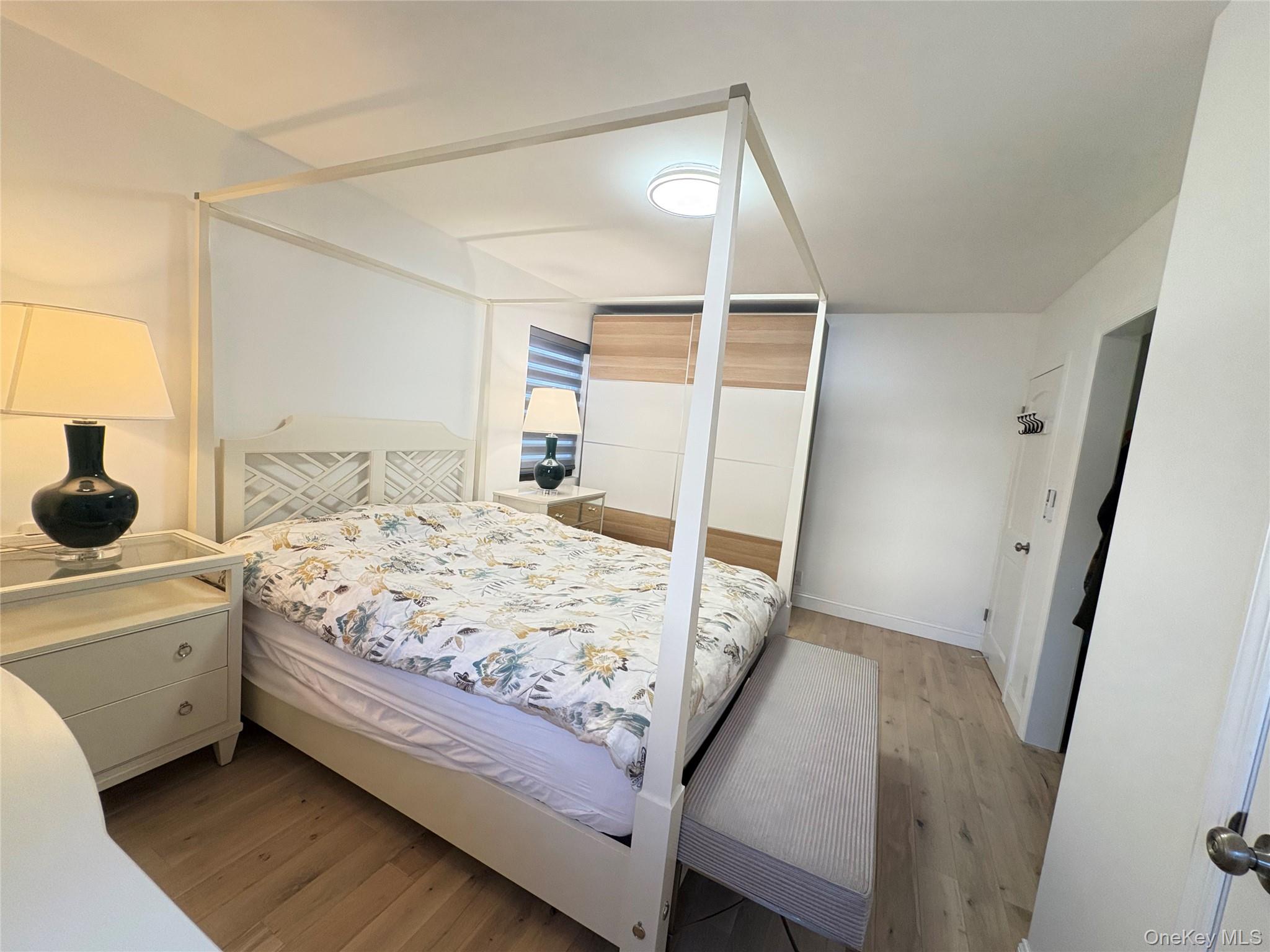 41-75 Morgan Street Queens, NY 11363 - Photo 22 of 50 a bedroom with a bed and cabinets