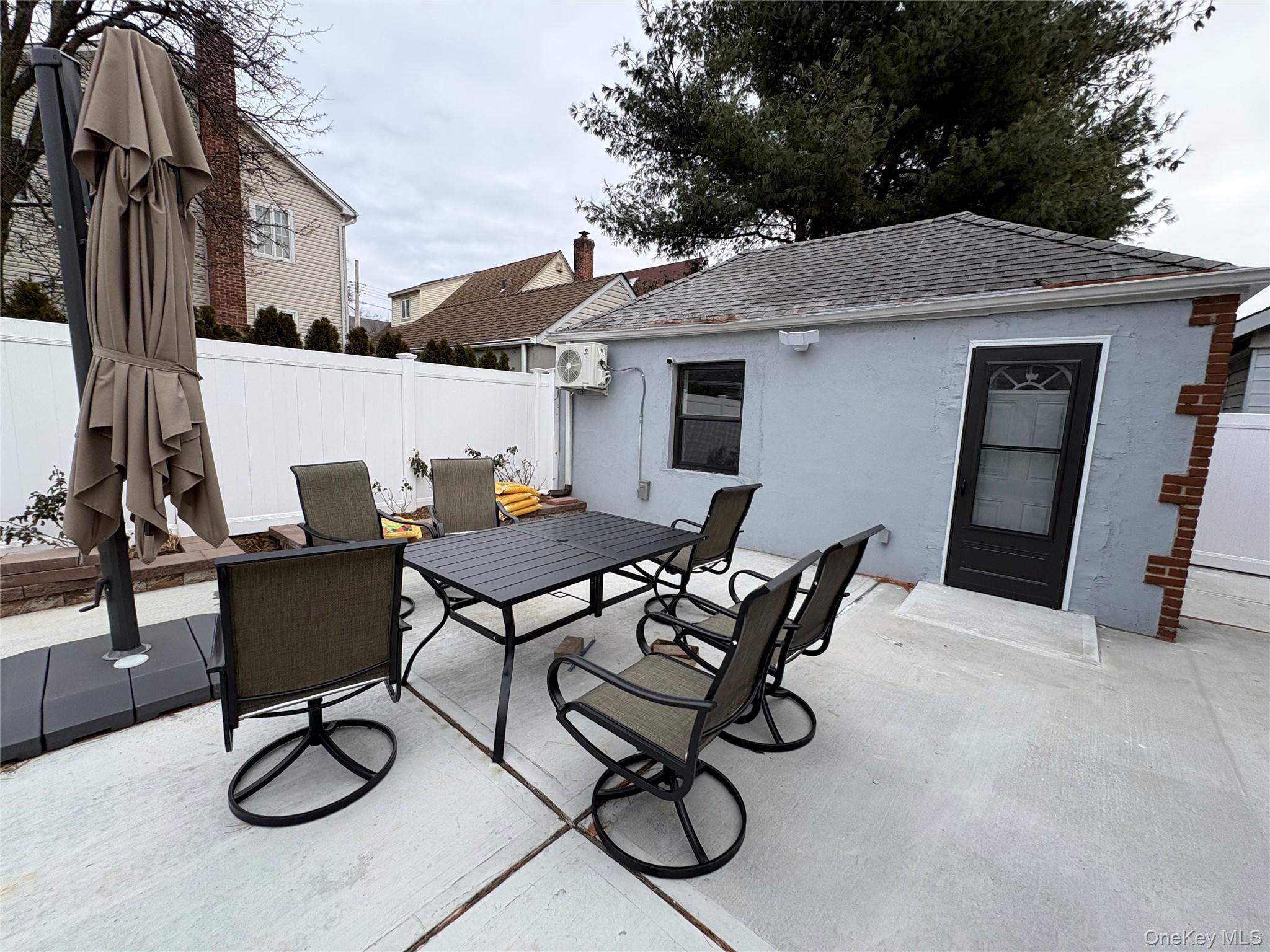 41-75 Morgan Street Queens, NY 11363 - Photo 43 of 50 a view of patio with furniture