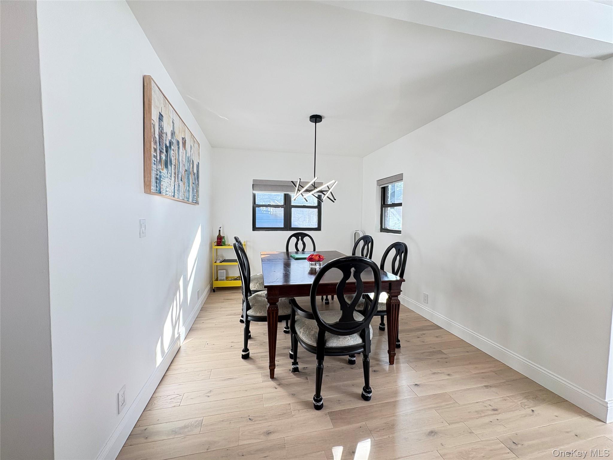 41-75 Morgan Street Queens, NY 11363 - Photo 6 of 50 a view of a dining room with furniture and window