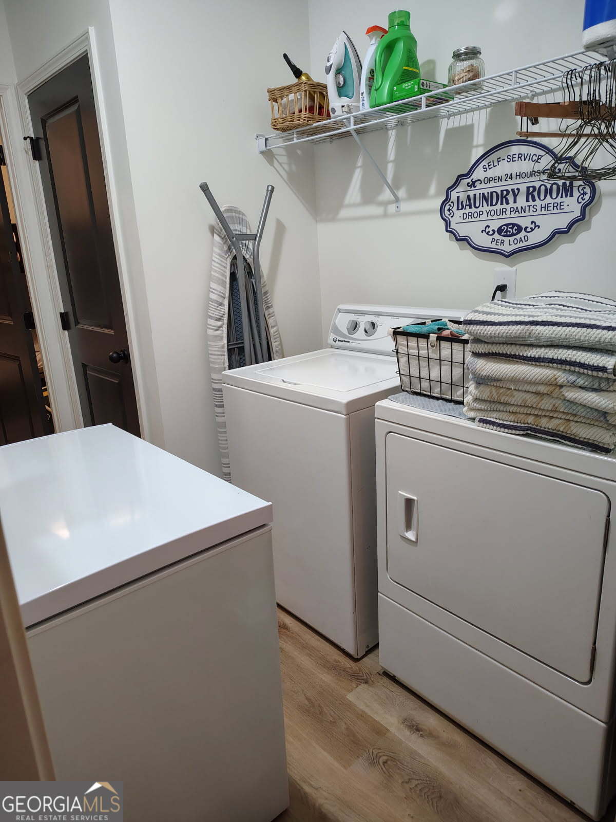 65 Magnolia Street Buchanan, GA 30113 - Photo 16 of 56 a close up view of washer and dryer