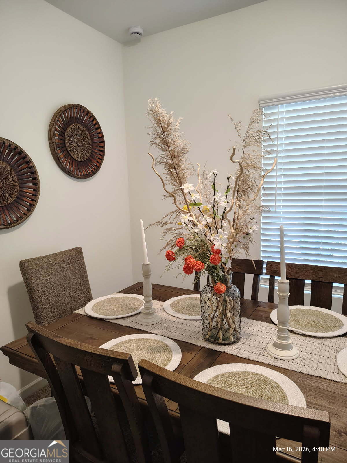 65 Magnolia Street Buchanan, GA 30113 - Photo 17 of 56 a view of a dining room with furniture and wooden floor