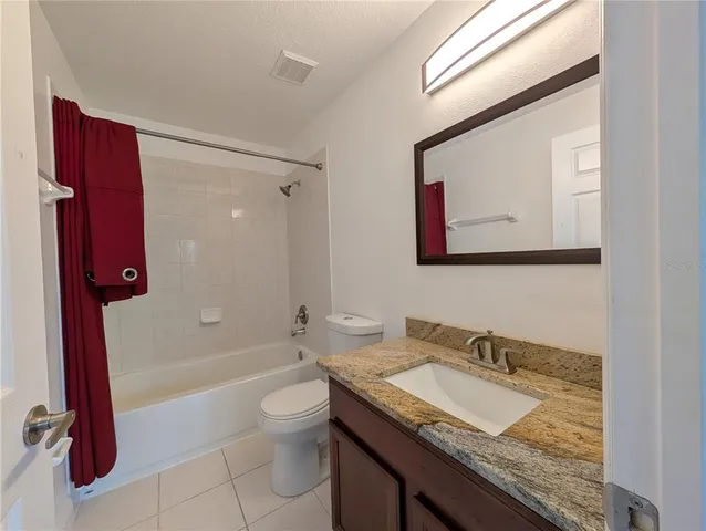 a view of a yard from a balcony