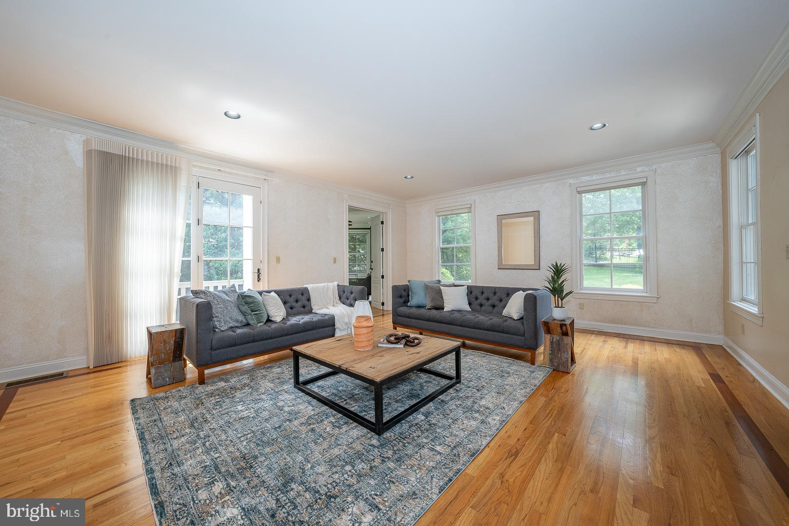 899 Black Rock Road Gladwyne, PA 19035 - Photo 14 of 59 a living room with furniture and a wooden floor