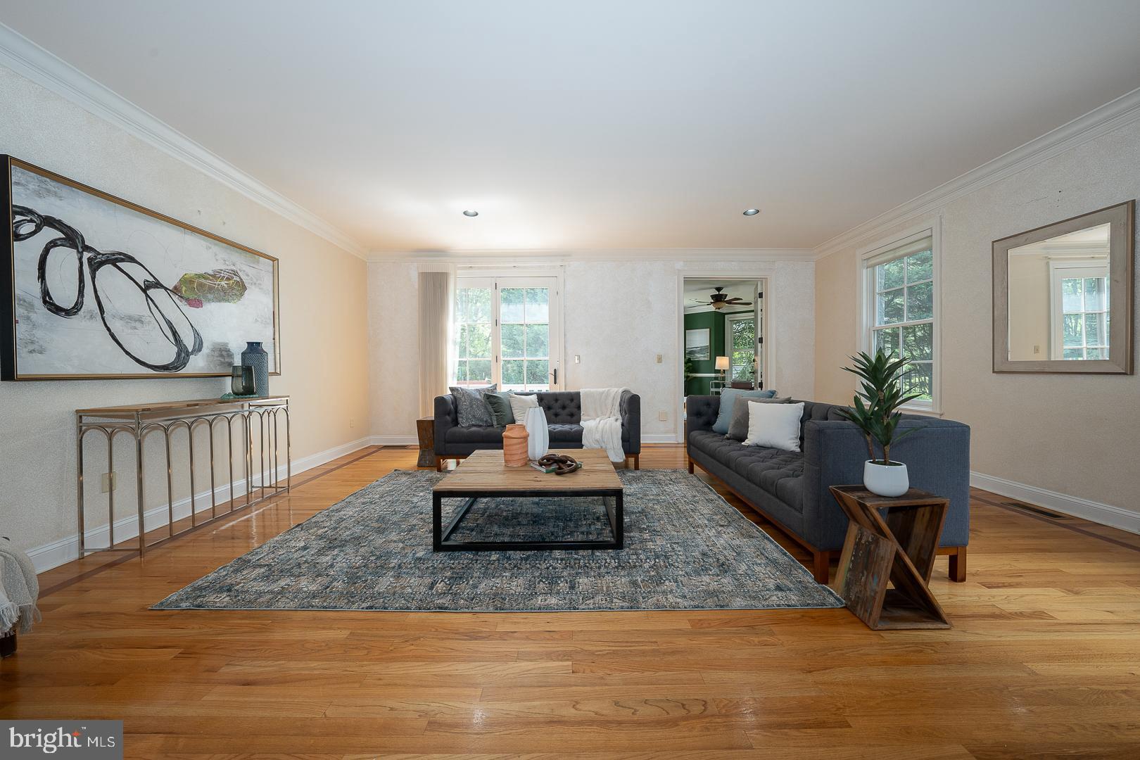 899 Black Rock Road Gladwyne, PA 19035 - Photo 15 of 59 a living room with furniture and a wooden floor
