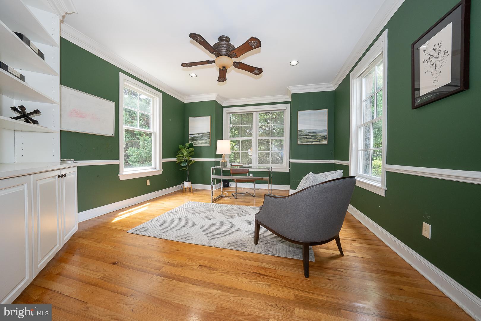 899 Black Rock Road Gladwyne, PA 19035 - Photo 17 of 59 a living room with furniture and a large window