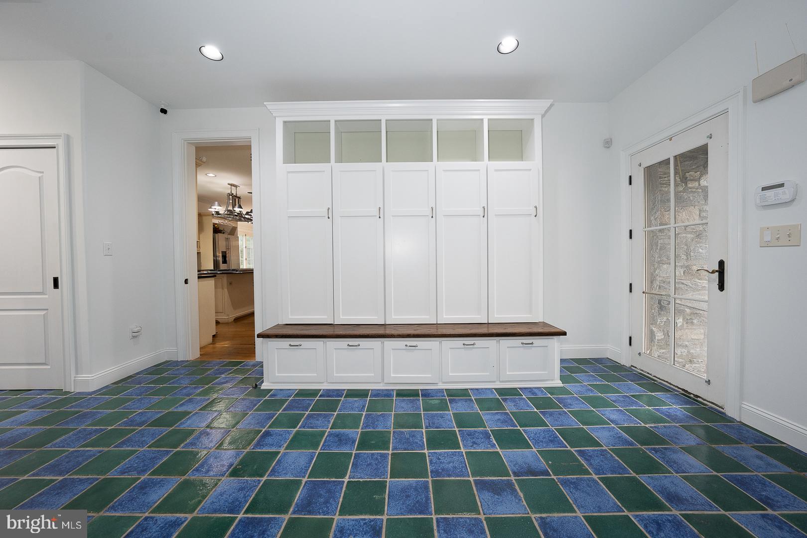 899 Black Rock Road Gladwyne, PA 19035 - Photo 20 of 59 a view of a utility room with a black and white checkered floor