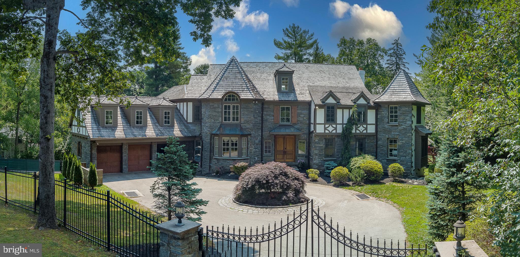 899 Black Rock Road Gladwyne, PA 19035 - Photo 2 of 59 a view of a house with backyard and sitting area