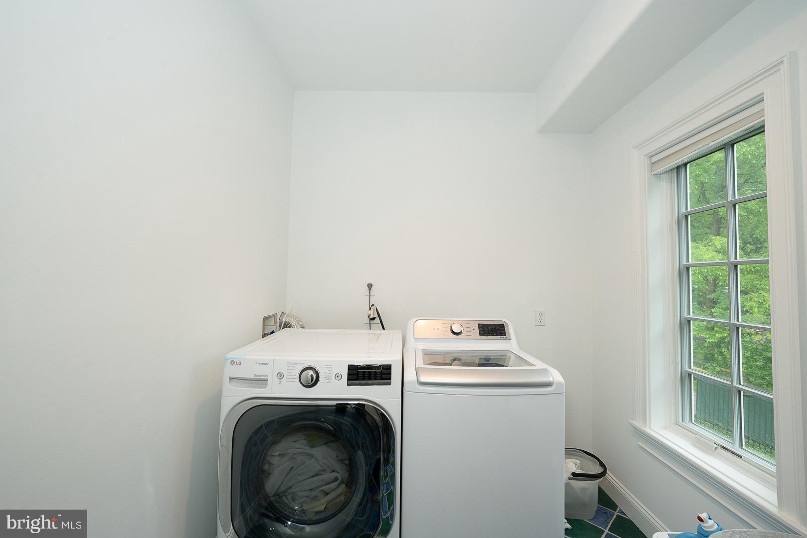 899 Black Rock Road Gladwyne, PA 19035 - Photo 21 of 59 a utility room with dryer and washer