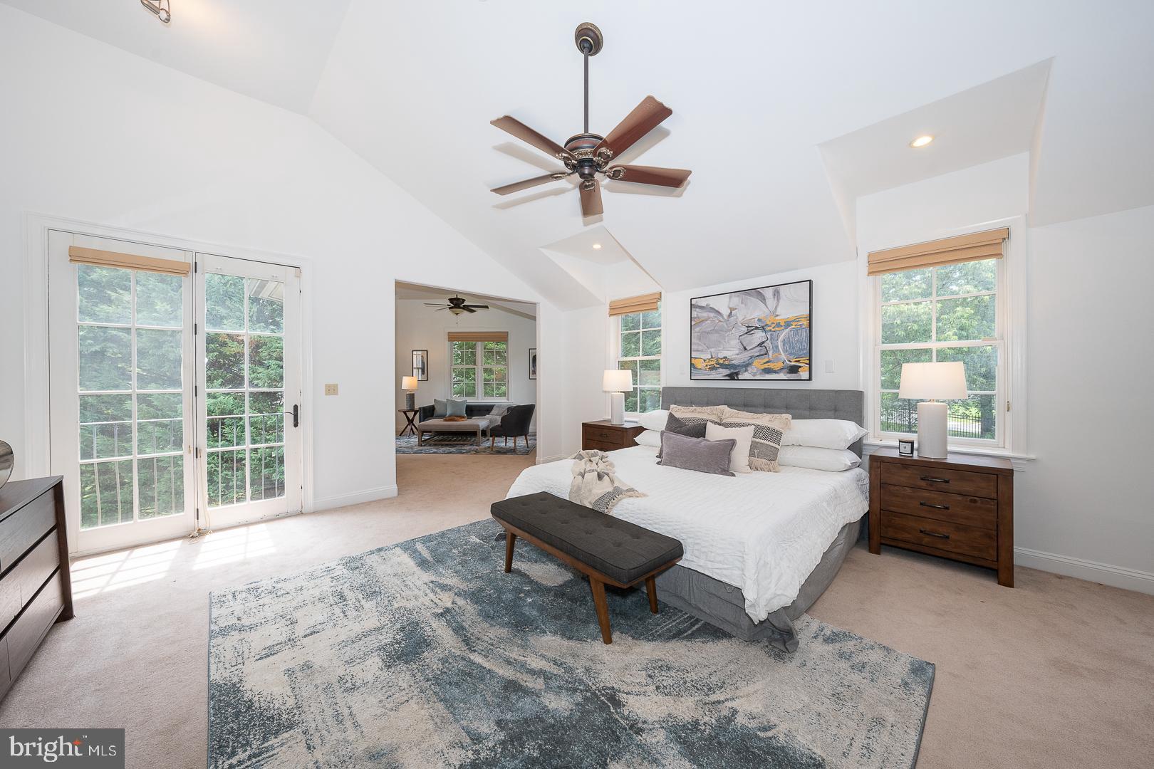 899 Black Rock Road Gladwyne, PA 19035 - Photo 23 of 59 a spacious bedroom with a large bed and a window