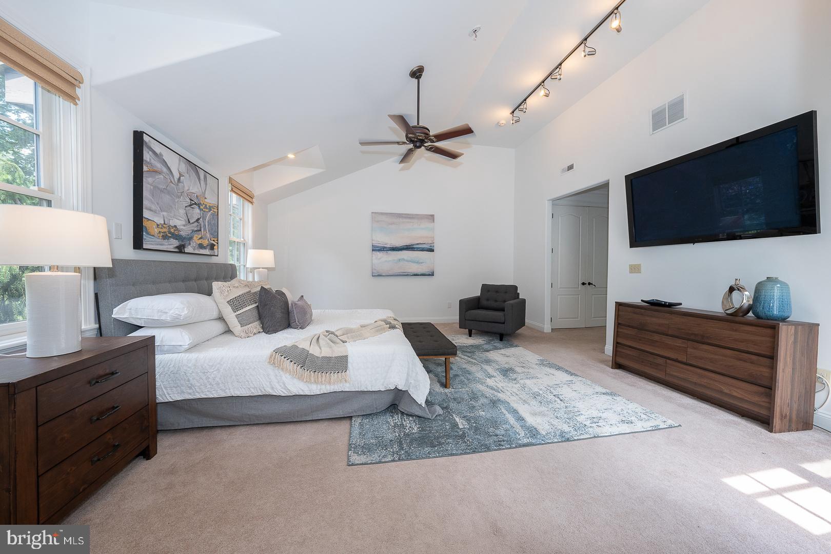 899 Black Rock Road Gladwyne, PA 19035 - Photo 24 of 59 a living room with furniture and a flat screen tv