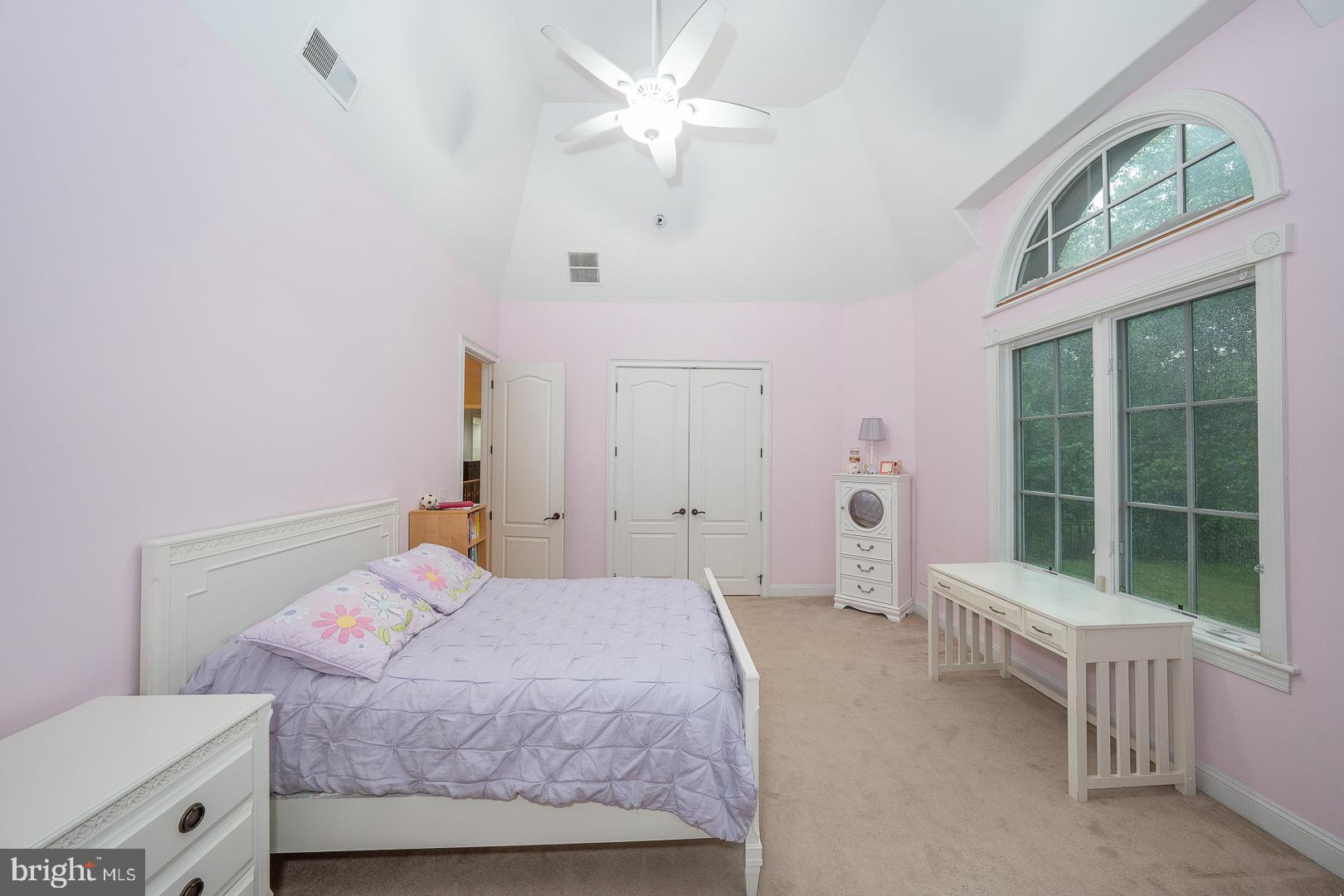 899 Black Rock Road Gladwyne, PA 19035 - Photo 34 of 59 a bedroom with a bed and a window