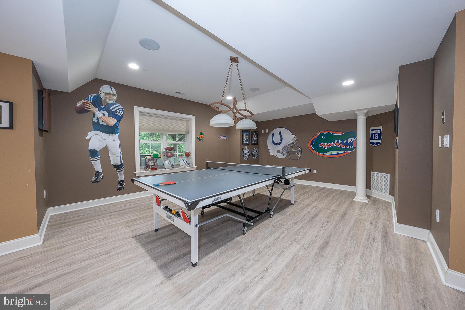 899 Black Rock Road Gladwyne, PA 19035 - Photo 48 of 59 a living room with pool table and a wooden floor