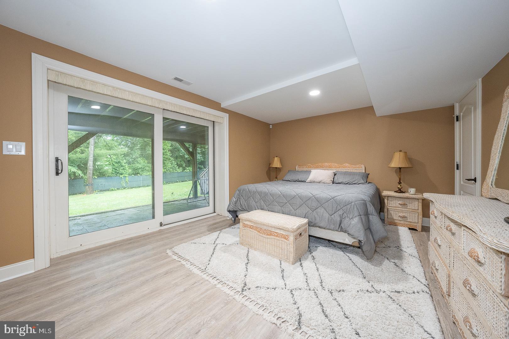 899 Black Rock Road Gladwyne, PA 19035 - Photo 53 of 59 a bedroom with a bed and a large window