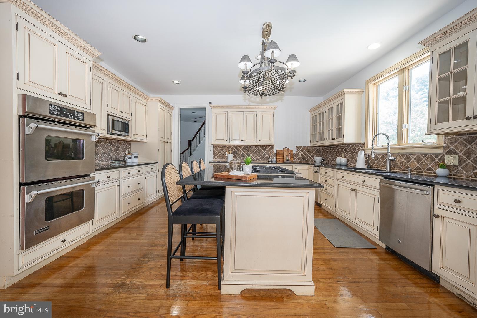 899 Black Rock Road Gladwyne, PA 19035 - Photo 6 of 59 a kitchen with a sink stainless steel appliances and cabinets