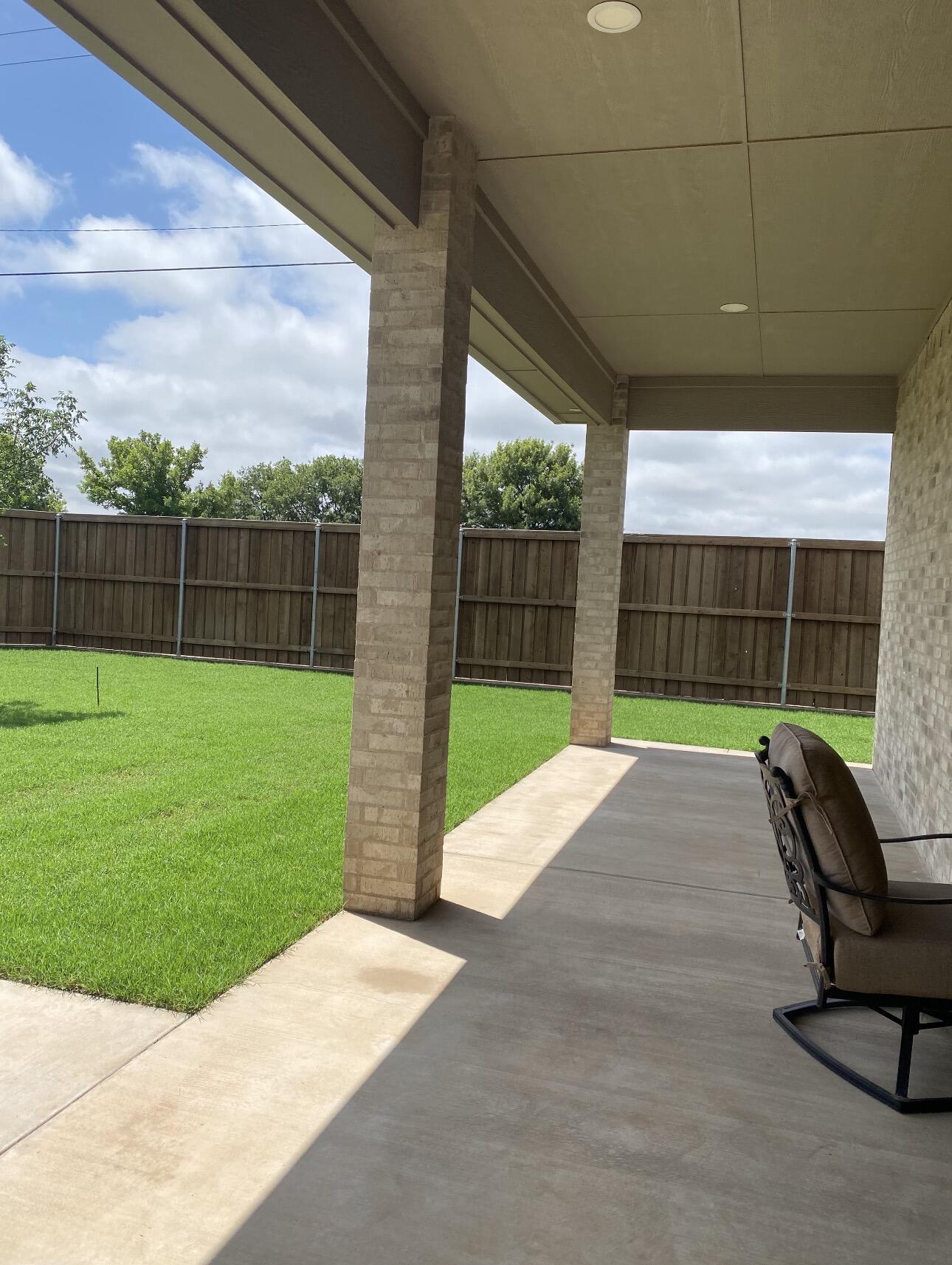 209 South Holliday Plainview, TX 79072 - Photo 28 of 29 a view of a backyard with a slide