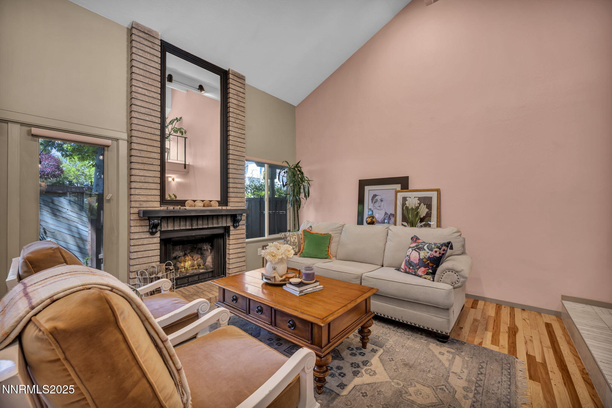 4307 Clyde Court Reno, NV 89509 - Photo 11 of 83 a living room with furniture and a fireplace