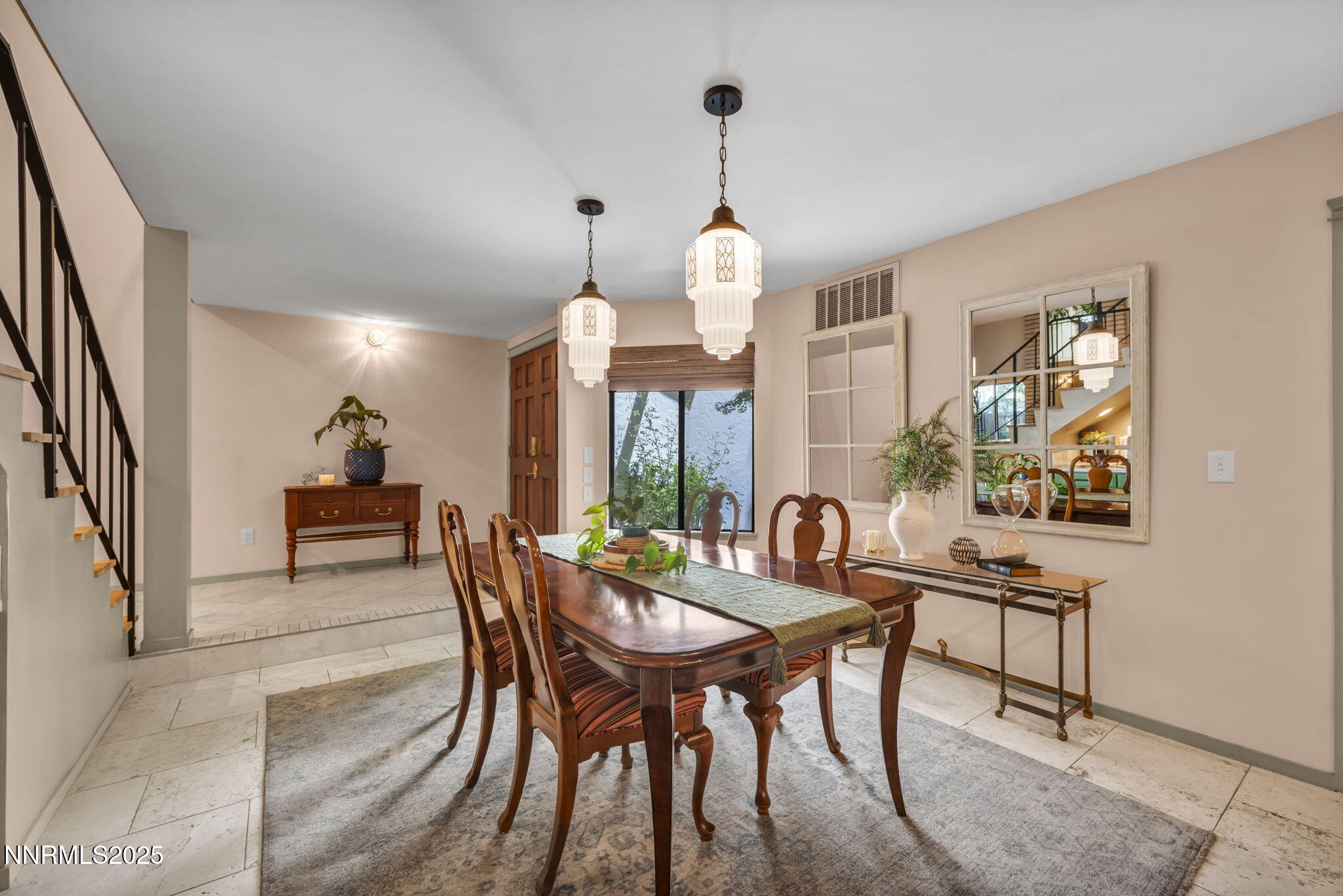4307 Clyde Court Reno, NV 89509 - Photo 16 of 83 a view of a dining room with furniture window and wooden floor