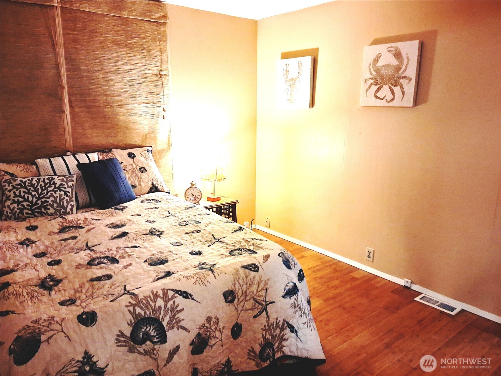815 124th Street Southwest, Unit 36 Everett, WA 98204 - Photo 22 of 32 a bedroom with a bed and painting on the wall