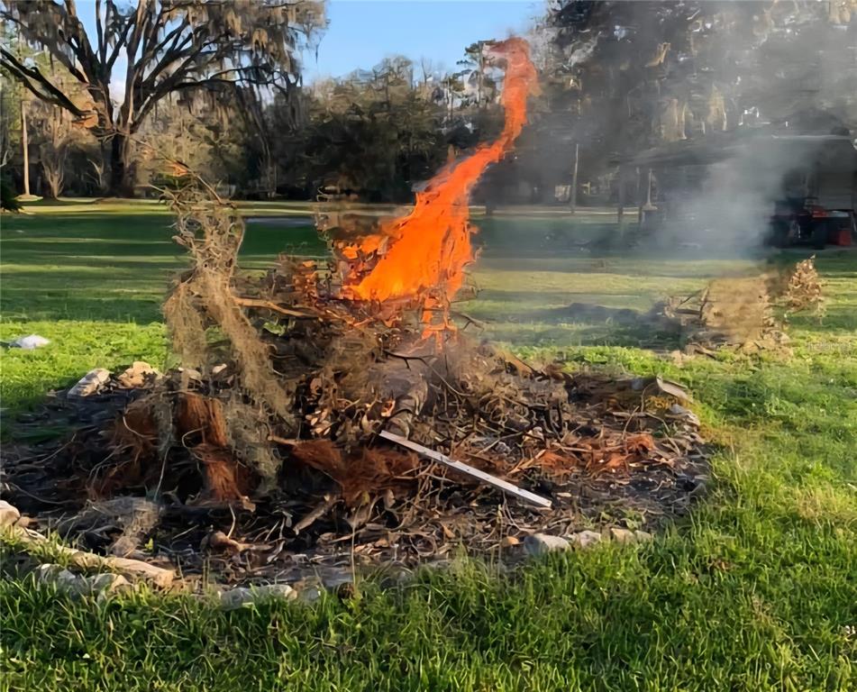 11419 Old Crystal River Road Brooksville, FL 34601 - Photo 15 of 89 a view of a house with a yard