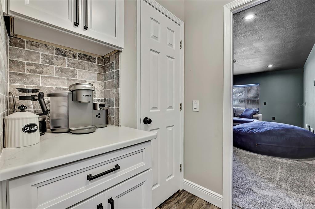 11419 Old Crystal River Road Brooksville, FL 34601 - Photo 35 of 89 a kitchen with a sink and cabinets