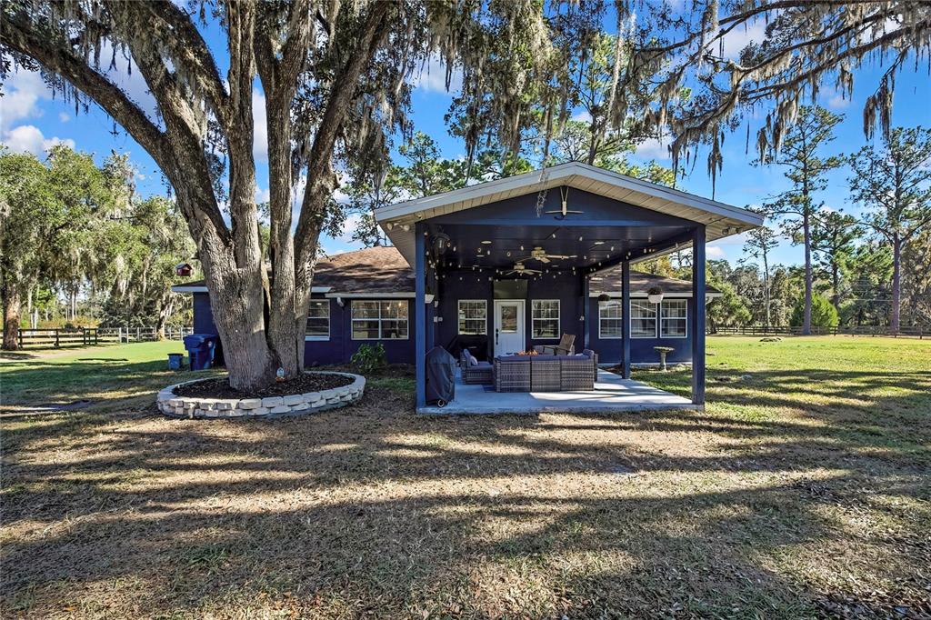 11419 Old Crystal River Road Brooksville, FL 34601 - Photo 55 of 89 a view of a water fountain in front of a house