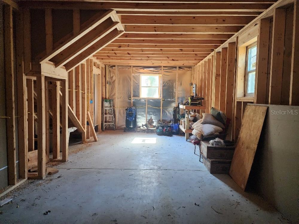 11419 Old Crystal River Road Brooksville, FL 34601 - Photo 65 of 89 a view of a hallway with seating area