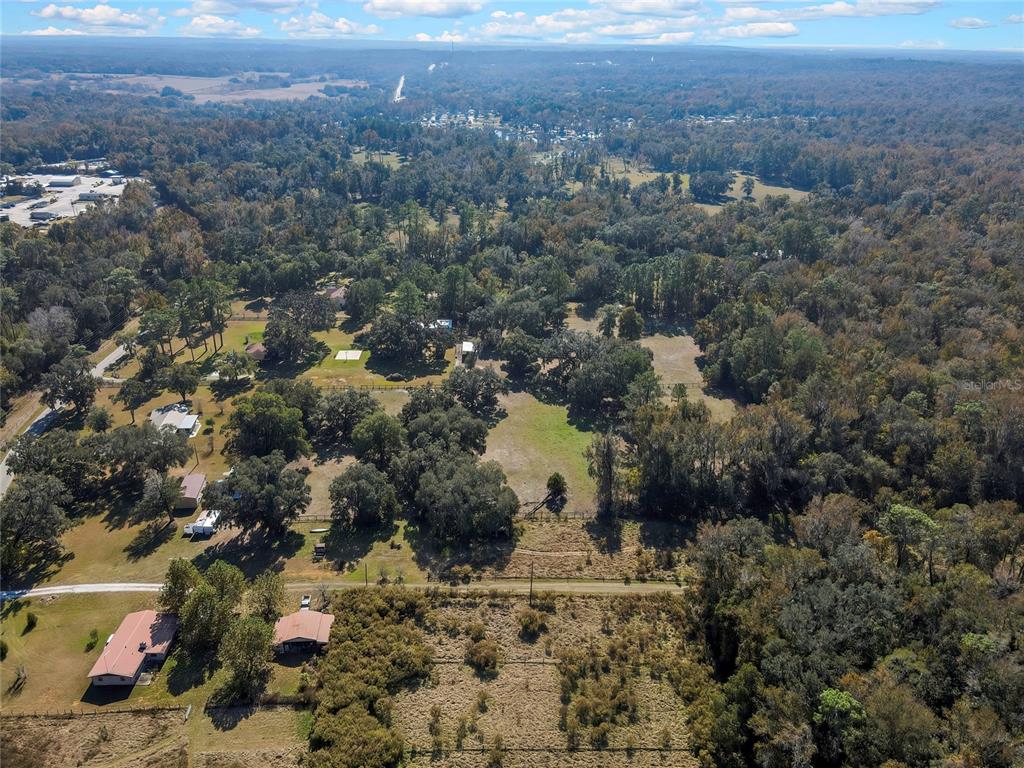 11419 Old Crystal River Road Brooksville, FL 34601 - Photo 85 of 89 a view of a houses with a yard