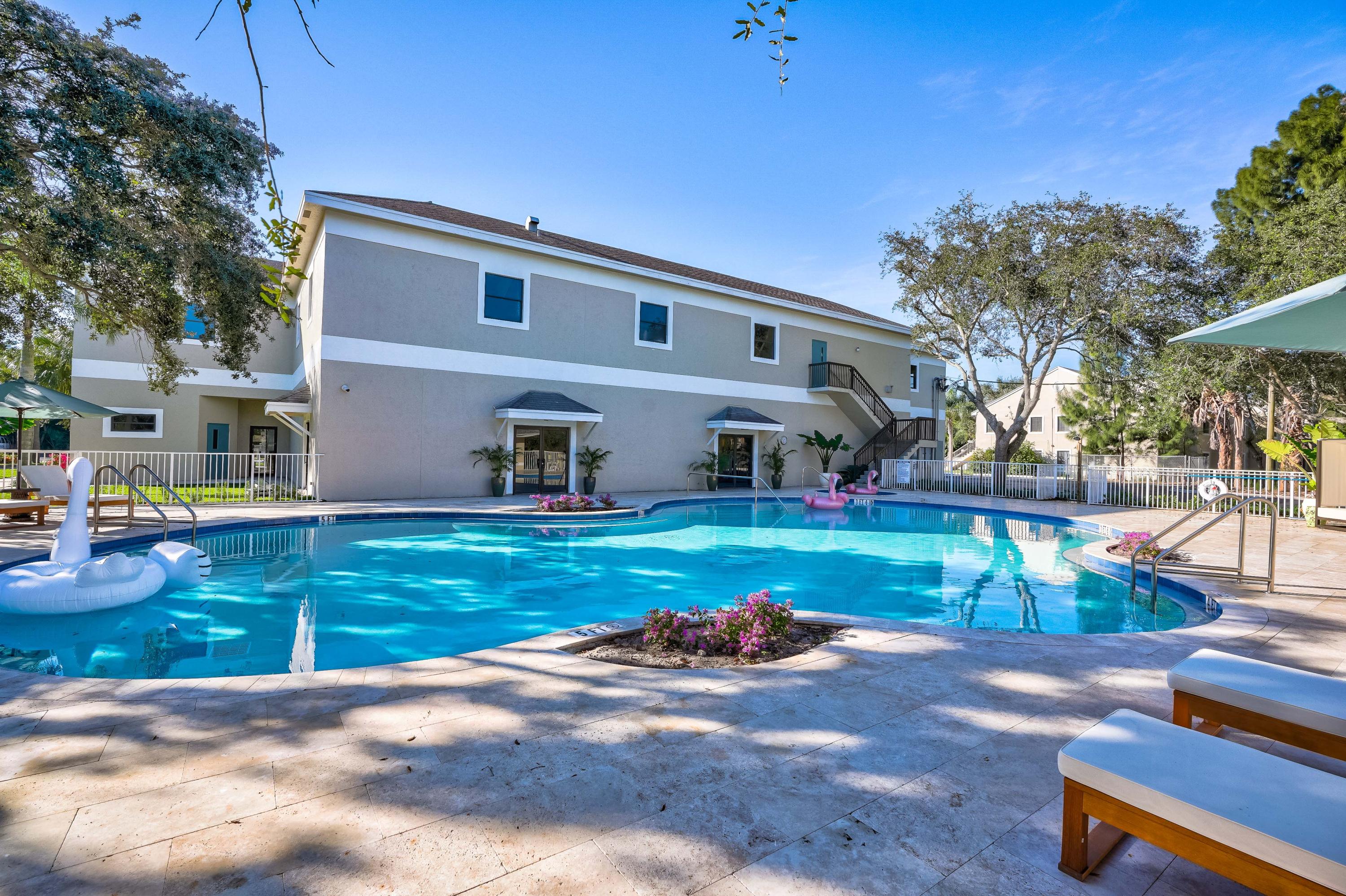 4685 Haverhill Road, Unit B11 West Palm Beach, FL 33417 - Photo 35 of 36 a view of a house with a yard