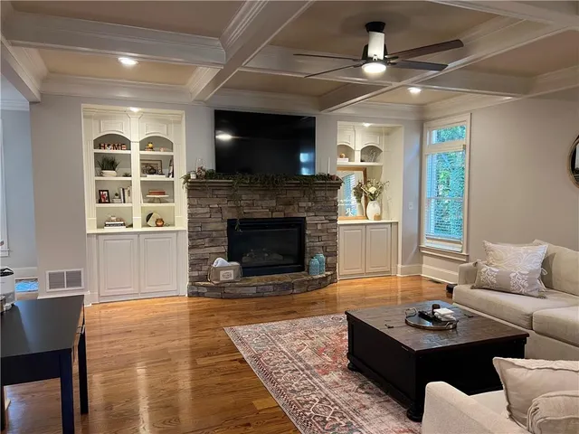 a kitchen with stainless steel appliances a sink and a refrigerator