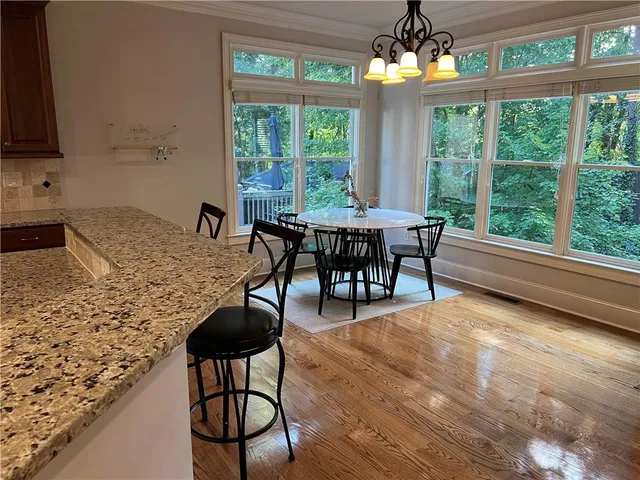 a view of deck with wooden floor and fence
