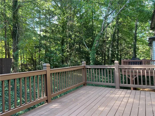 a en suite bathroom with a sink a mirror and a shower