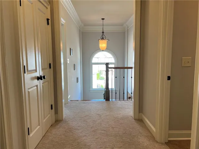 an aerial view of residential house with outdoor space and swimming pool