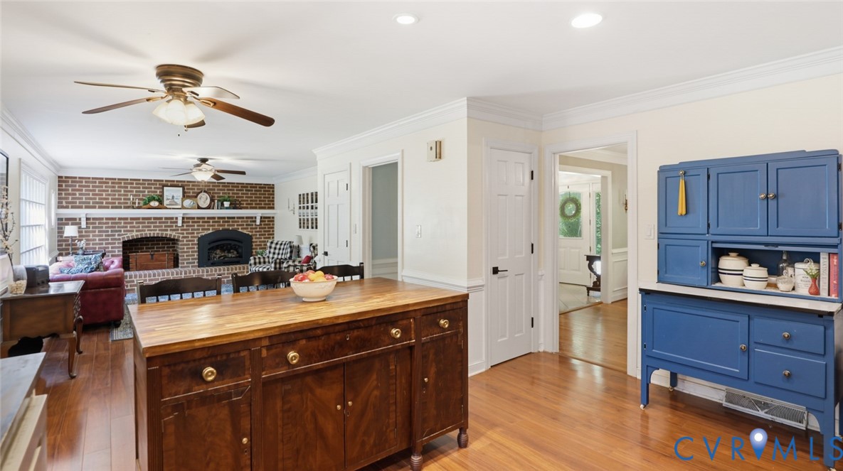 10716 Chalkley Road Richmond, VA 23237 - Photo 17 of 46 a living room with furniture and a fireplace