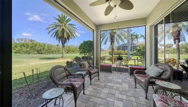 a kitchen with granite countertop a sink stove and cabinets