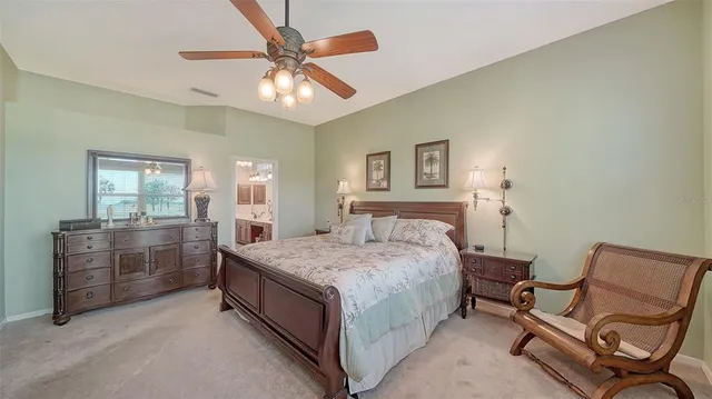 a en suite bathroom with double sink and a mirror