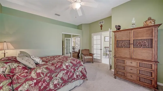 a en suite bathroom with a sink a mirror and a shower