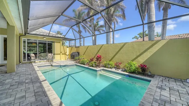 a view of a patio with couches chairs and potted plants