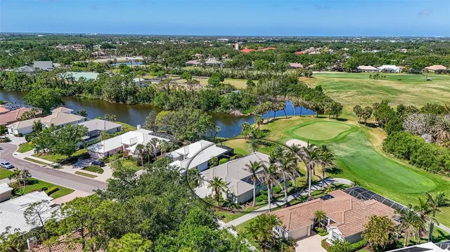 a view of a house with garden and plants