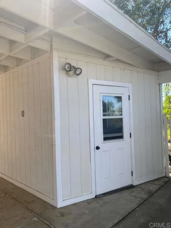 a view of a hallway with closet area