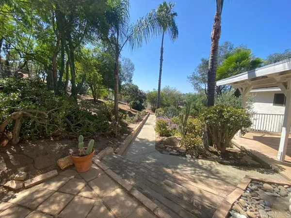 a view of a backyard of a house