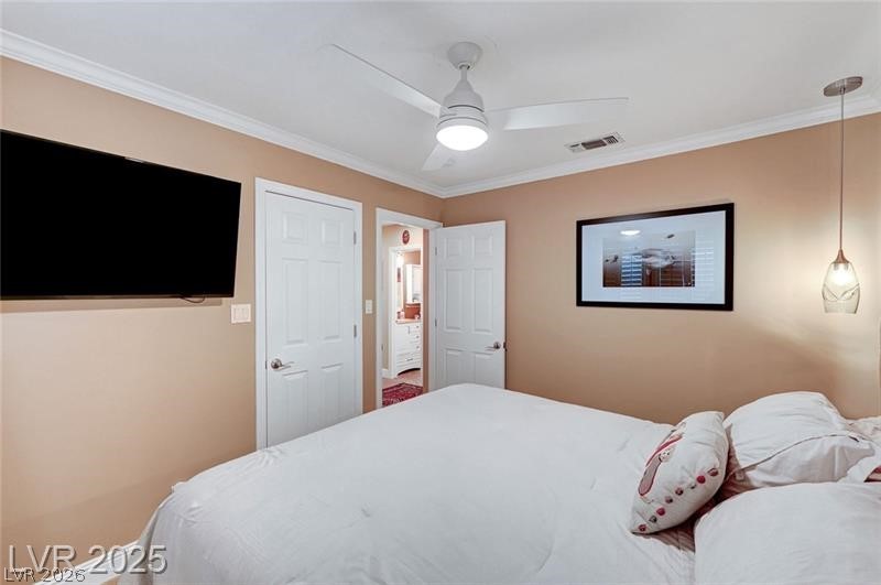 2410 Doherty Way Henderson, NV 89014 - Photo 31 of 63 Bedroom featuring crown molding and ceiling fan