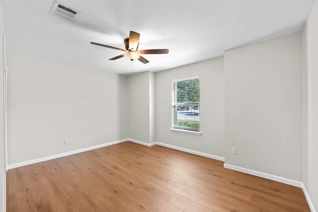 a kitchen with stainless steel appliances granite countertop a refrigerator and a stove