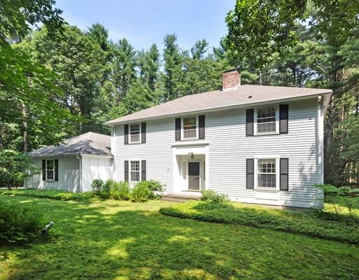256 Hunters Ridge Road Concord, MA 01742 - Photo 1 of 16 a front view of a house with a yard